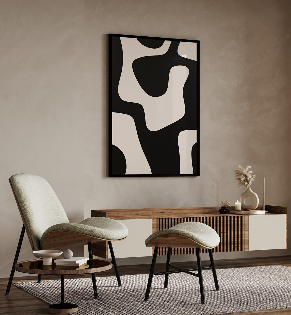 Black and White Pattern Stripes II Abstract Paintings Abstract Art Prints in Black Plain Frame placed on a Beige Colored Wall above a Console Table in the Drawing Room