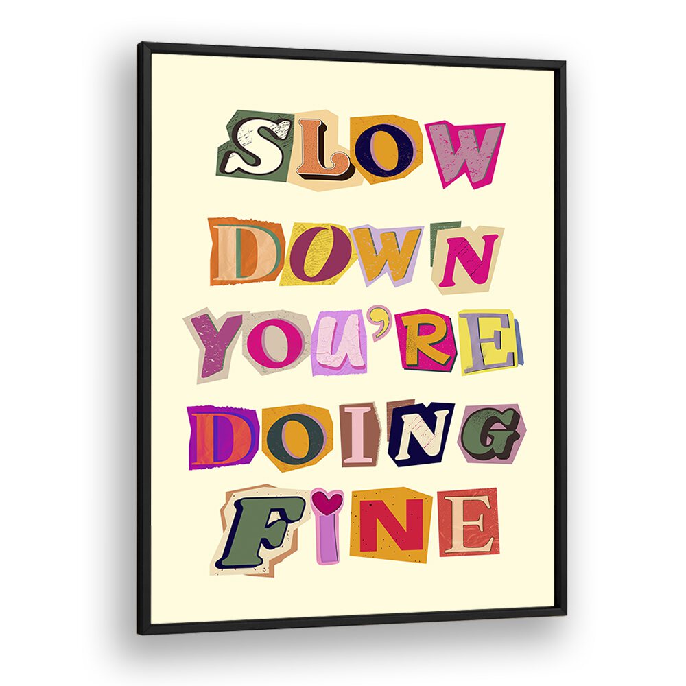 Colorful framed art print featuring the phrase "SLOW DOWN YOU'RE DOING FINE" for uplifting decor.