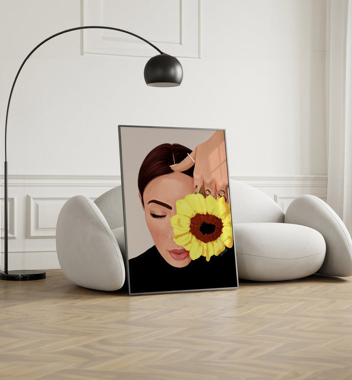 Bloom Portraits And Figurative Illustrations in Black Plain Frame placed on the floor near a White Sofa in the Living Room