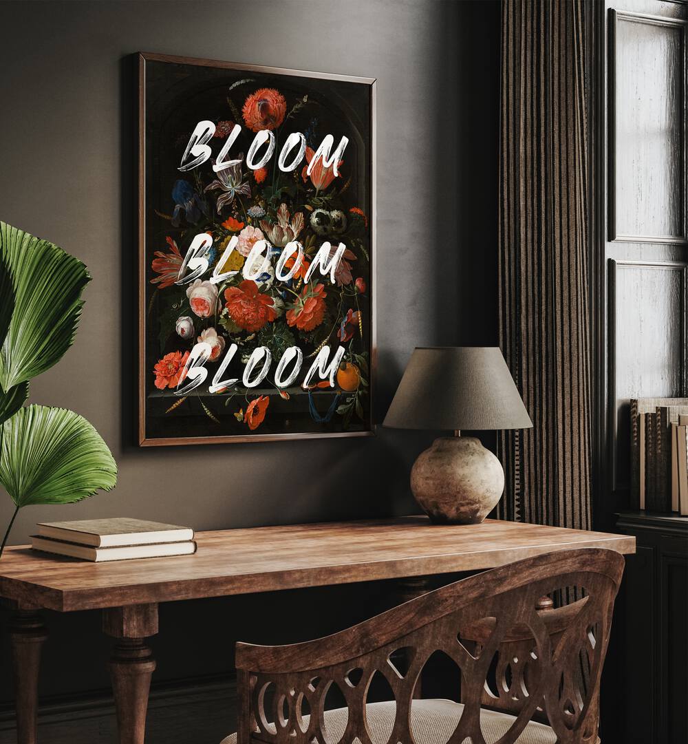 Bloom Vintage Flowers by the Art Concept Altered Art Prints in Dark Wood Plain Frame placed on a wall above a study table