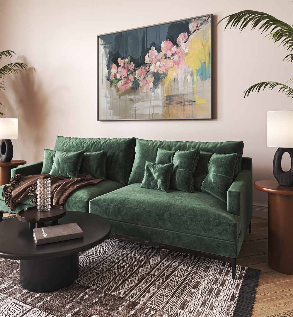 Vibrant BLOSSOMS IN BLOOM, FLORAL FLOWER PAINTINGS adding beauty to a stylish living space with a cozy green sofa.