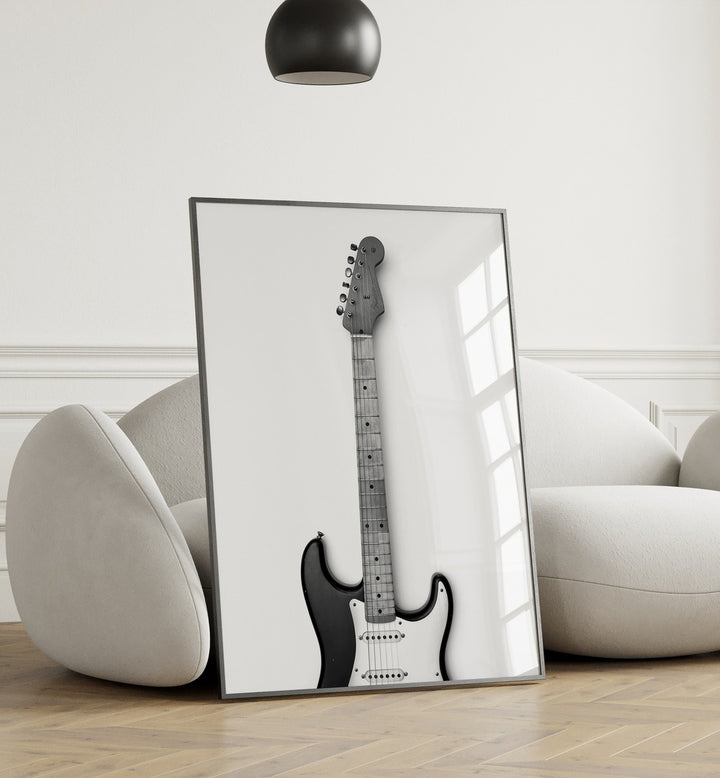 Blues Breaker Twang by David Drake Fine Art Photography Fashion Photography in Black Plain Frame placed on the floor behind a sofa