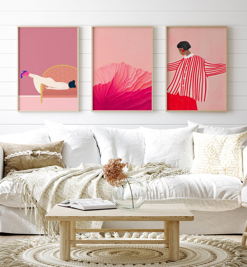 Blush Pink Set Set Of 3 Paintings in Oak Wood Plain Frame placed on a wall living room wall behind a sofa