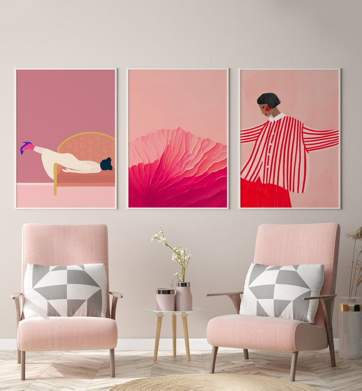 Blush Pink Set Set Of 3 Paintings in White Plain Frame placed on the wall behind pink chairs