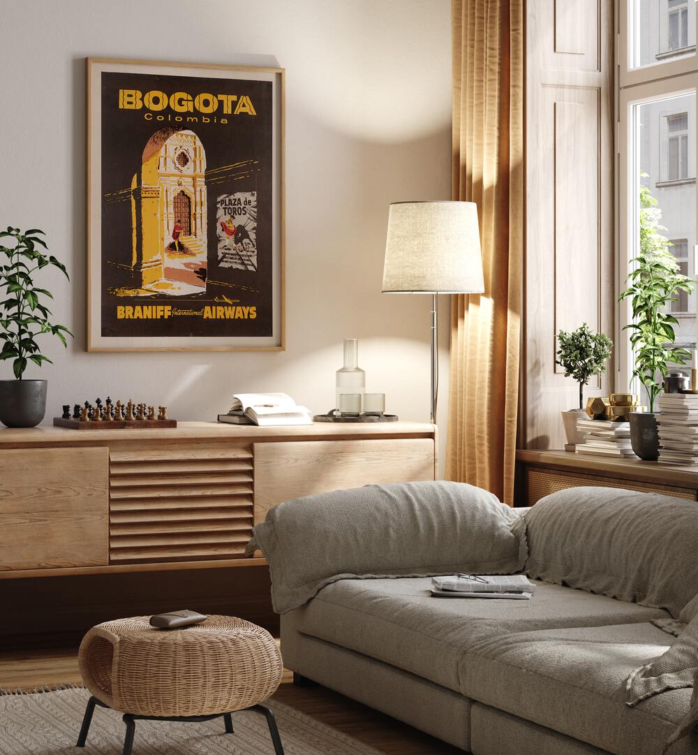 Bogota-Columbia  Retro Travel Posters in Oak Wood Plain Frame placed on a wall behind a console table