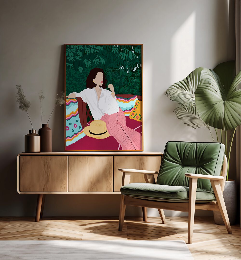 Bohemian Soul By Uma Gokhale Woman Illustration Paintings in Oak Wood Plain Frame on a console table beside a plant