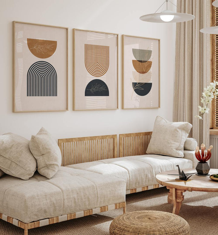 Boho Geometrical Shapes I Set Of 3 Paintings in Oak Wood Plain Frame placed on a wall living room wall behind a sofa