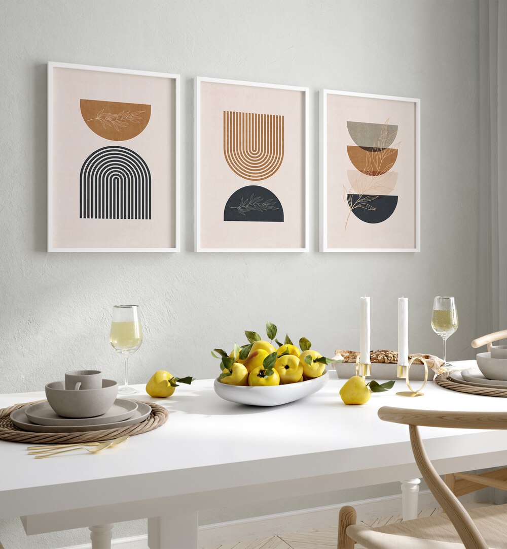 Boho Geometrical Shapes I Set Of 3 Paintings in White Plain Frame placed on a wall behind a dining table for dining area