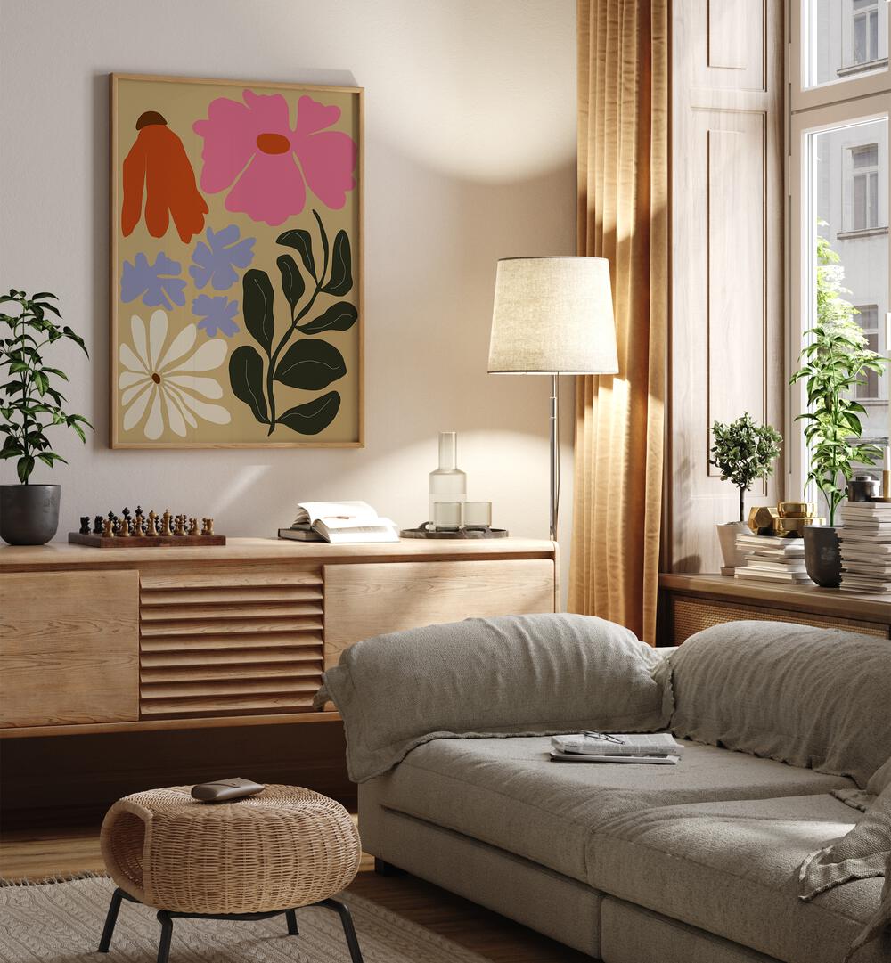 Bold Matisse Floral By Miho Art Studio Botanical Art Prints Floral Paintings in Oak Wood Plain Frame placed on a Cream Colored Wall above a Console Table near a Beige Sofa in the Living Room