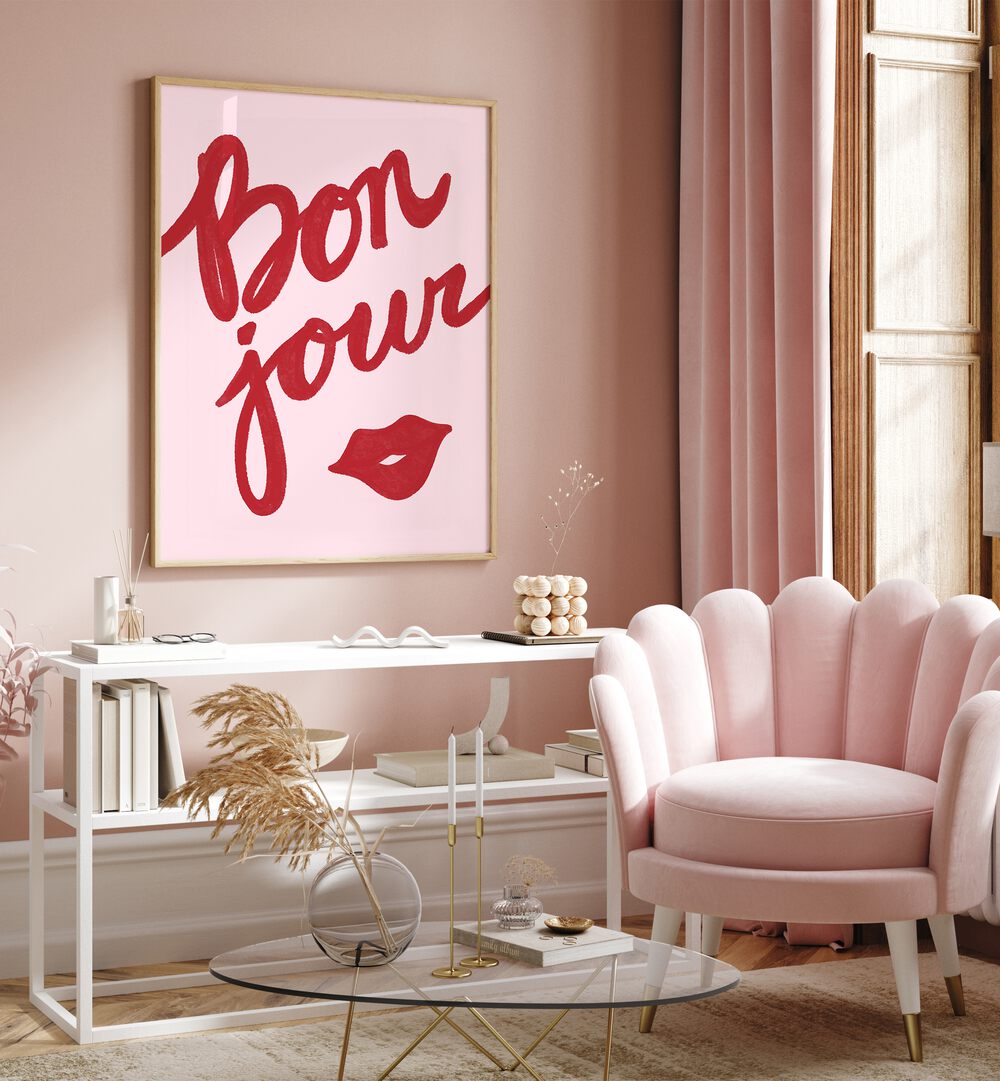 Bonjour Lip by Athene Fritsch Quotes Posters Wall Art Prints in Oak Wood Plain Frame placed on a wall behind a table