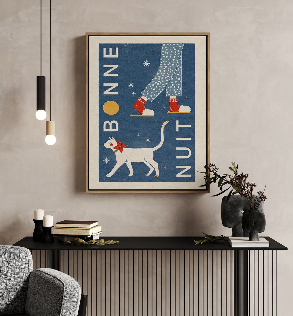 Bonne Nuit By Julia Leister Wall Art Prints in Oak Wood Floater Frame on a beige wall placed behind a table