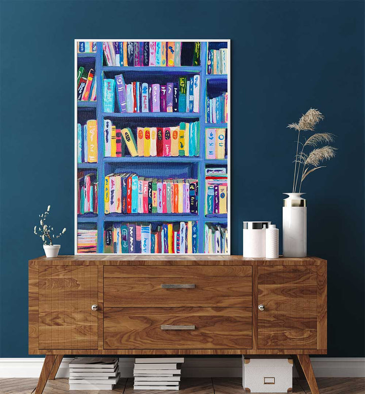 BOOKSHELF AT THE CHÂTEAU , FASHION POSTERS showing vibrant couture-inspired bookshelf print above a wooden console