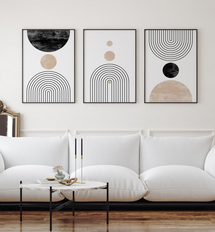 Boon Boho Lines Set Of 3 Paintings in Black Plain Frame placed on a wall living room wall behind a sofa