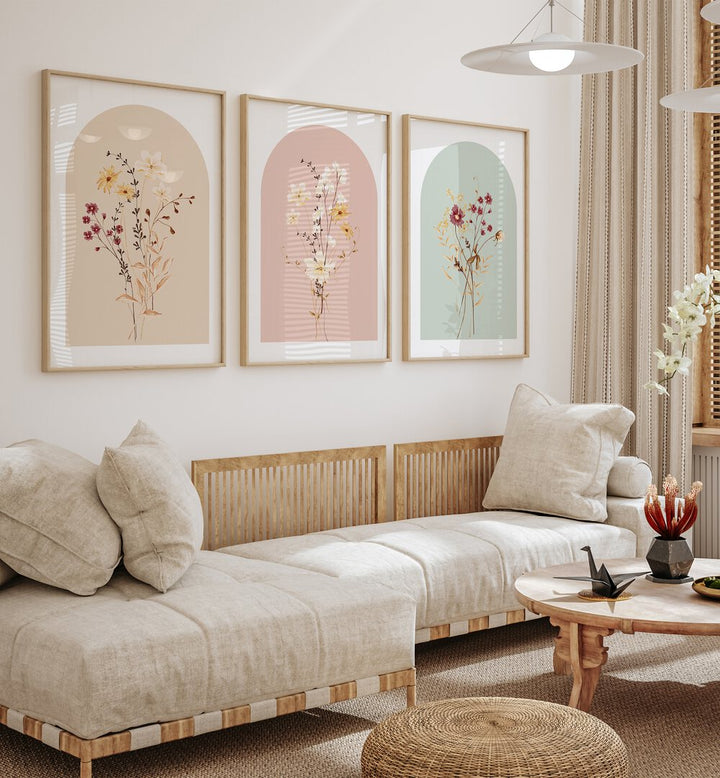 Botanica Set Set Of 3 Paintings in Oak Wood Plain Frame placed on a wall living room wall behind a sofa