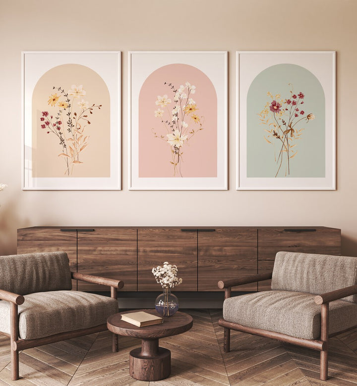 Botanica Set Set Of 3 Paintings in White Plain Frame placed on a wall behind a console table