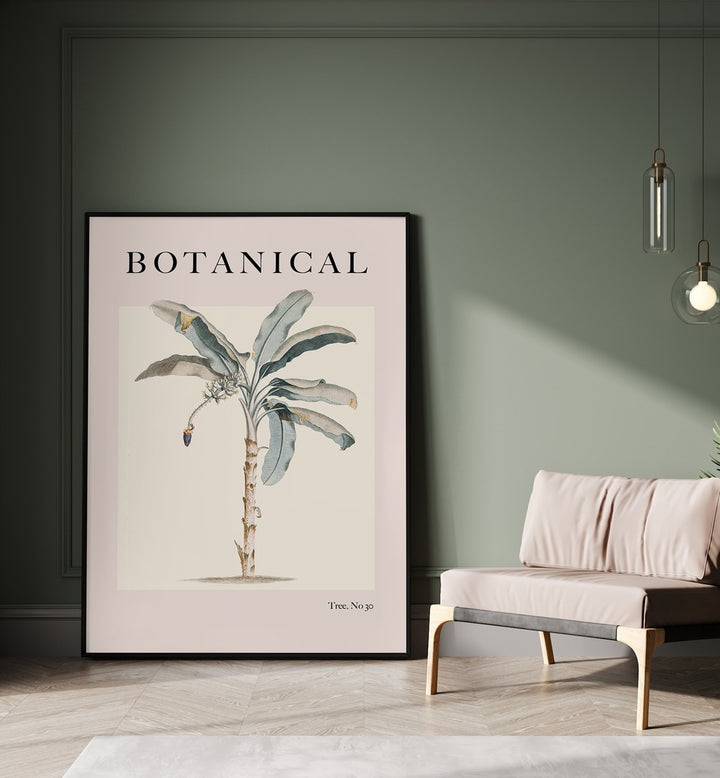 Botanical Palm By Grace Digital Art Co Beach Prints in Black Plain Frame placed on a floor beside a sofa