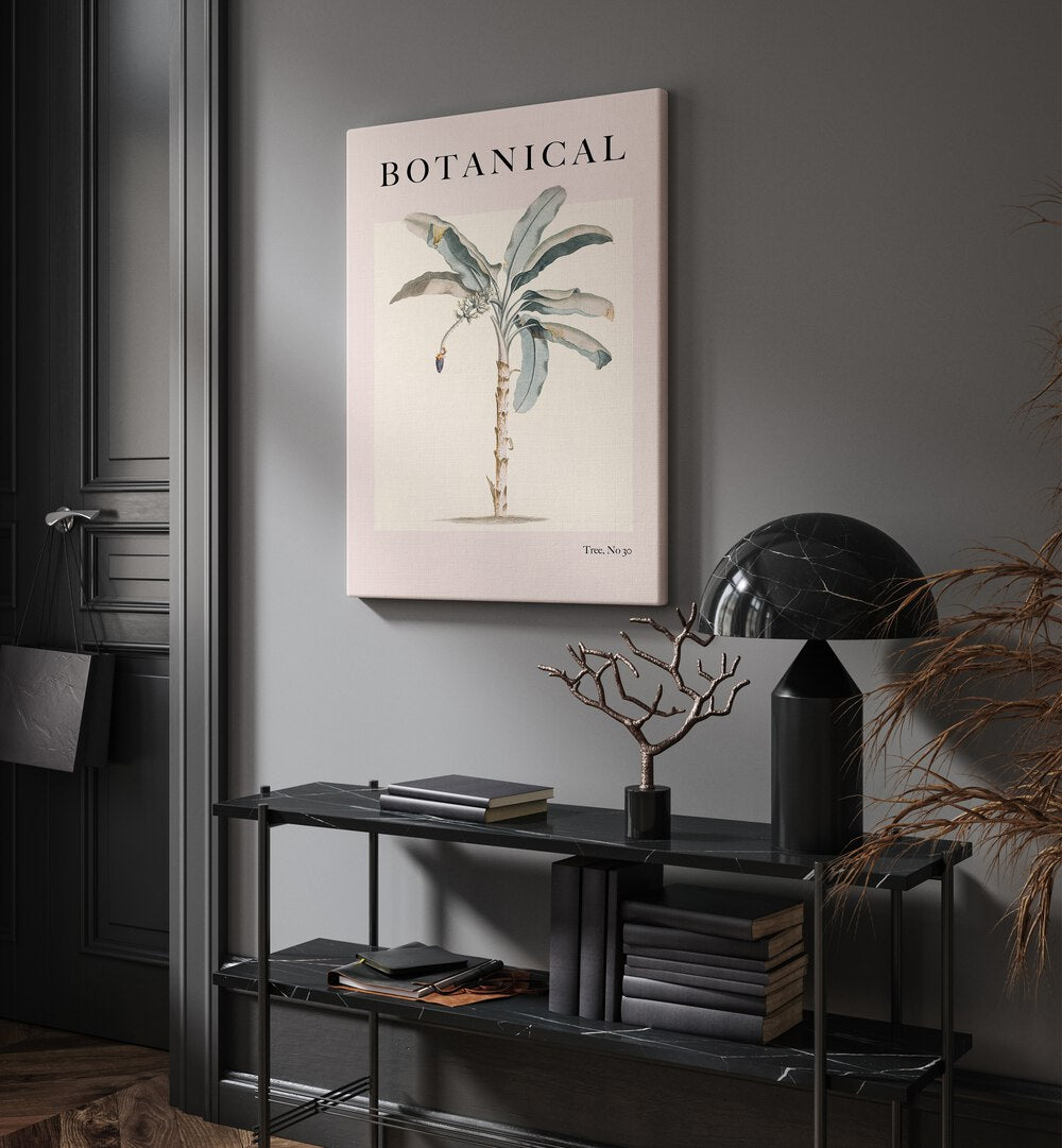 Botanical Palm By Grace Digital Art Co Beach Prints in Gallery Wrap placed on a wall behind a table and beside a door