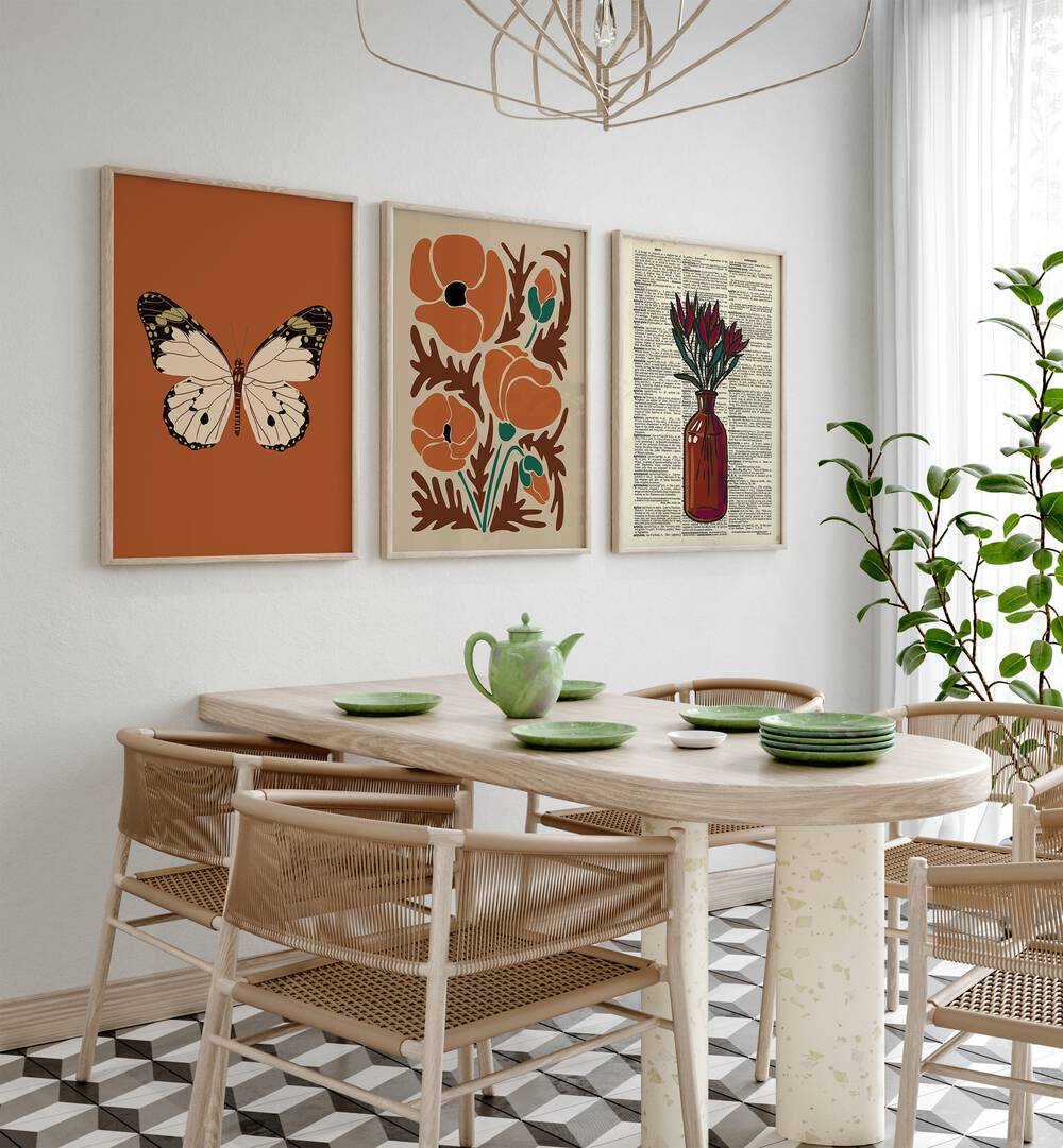 Botanical Set Set Of 3 Paintings in Oak Wood Plain Frame placed on a wall behind a dining table and beside a window for dining area