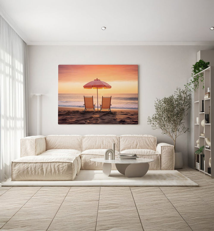 BOTH FACING THE OCEAN, BEACH PAINTINGS capture serene coastal vibes with elegant chairs and a colorful umbrella.