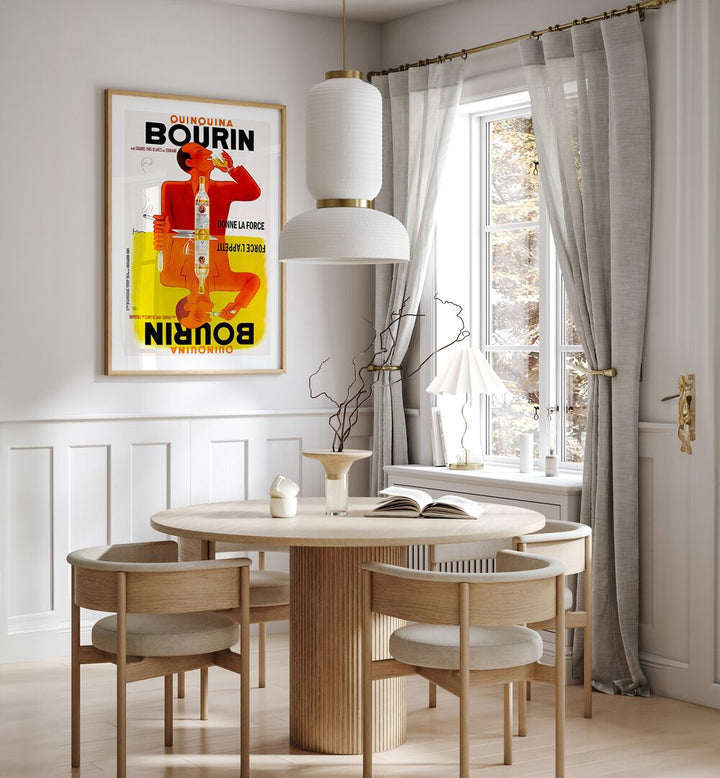 Bourin Cafe Art Prints Cafe Posters in Oak Wood Plain Frame placed on a wall in a dining room area beside a window and behind a dining table