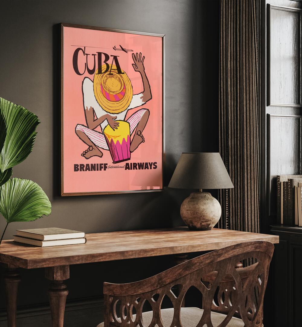 Braniff Airways-cuba  Retro Travel Posters in Oak Wood Plain Frame placed on a wall behind a study table