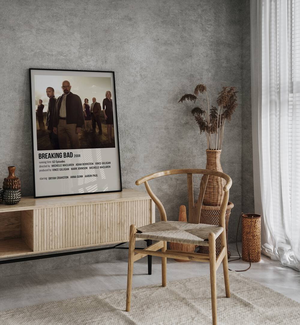 Breaking Bad Movie Posters in Black Plain Frame placed on a console behind a chair