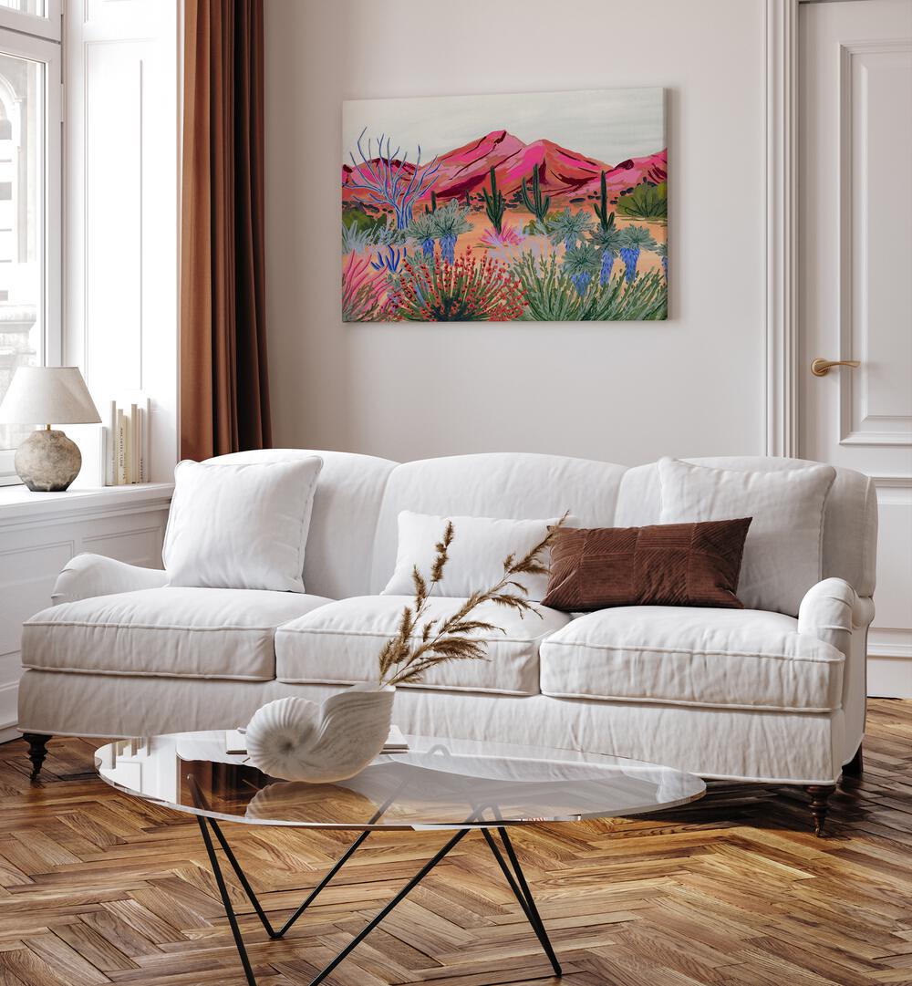 Bright Desert By Sarah Gesek Landscape Art Prints in Gallery Wrap placed on a living room wall behind behind a white sofa beside a window