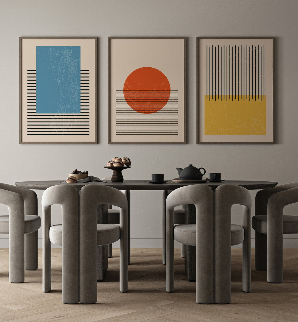 Bright Minimal Set ii Set Of 3 Paintings in Black Plain Frame placed on a wall behind a dining table a for dining area