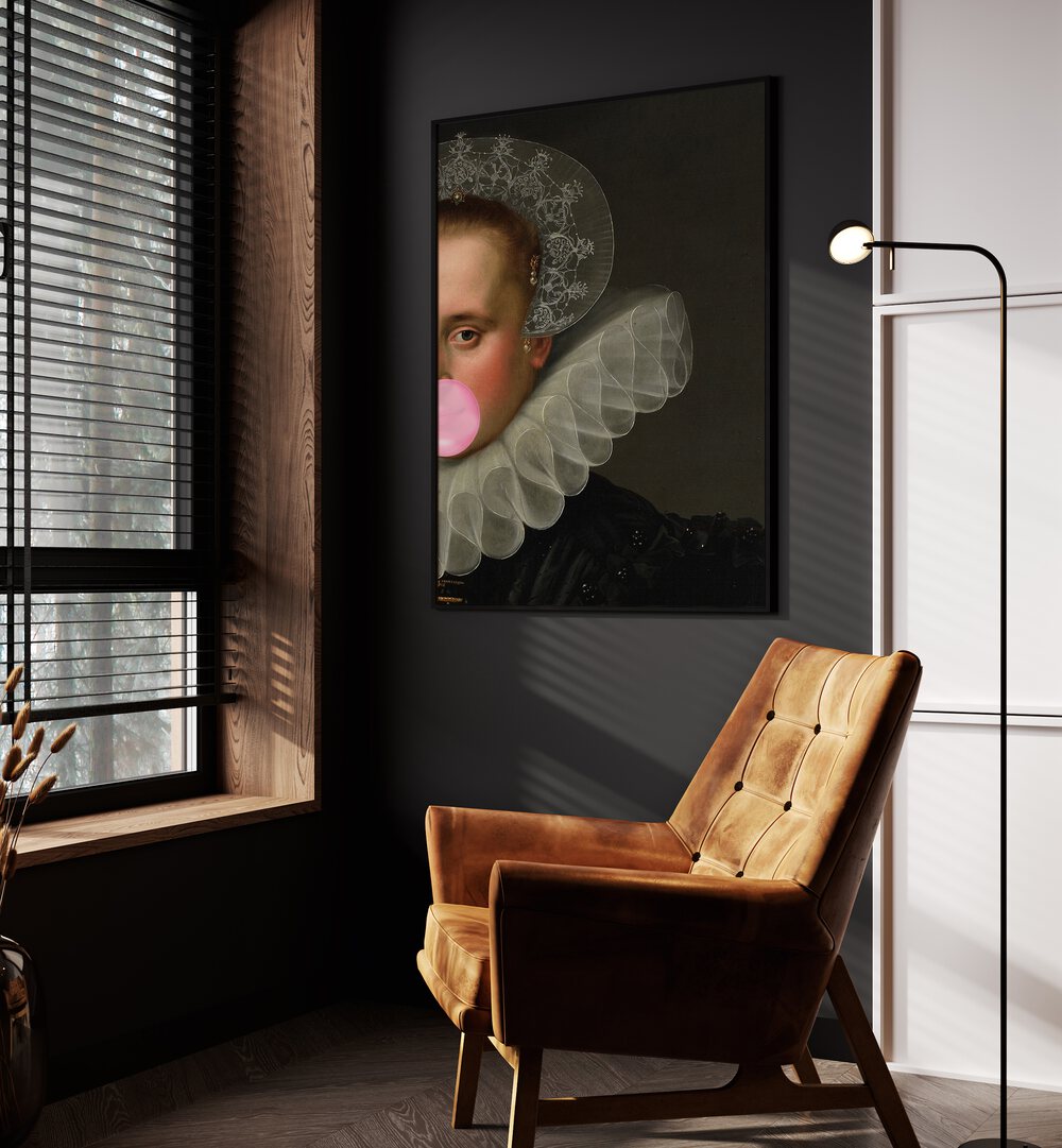 Bubble Gum Queen by the Art Concept Altered Art Prints in Black Plain Frame paced on a wall beside an orange sofa