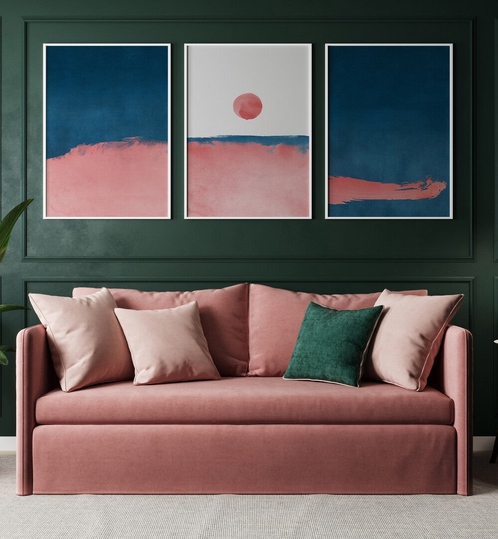 Bubblegum Mist Set Set Of 3 Paintings in White Plain Frame placed on a green wall behind a pink sofa