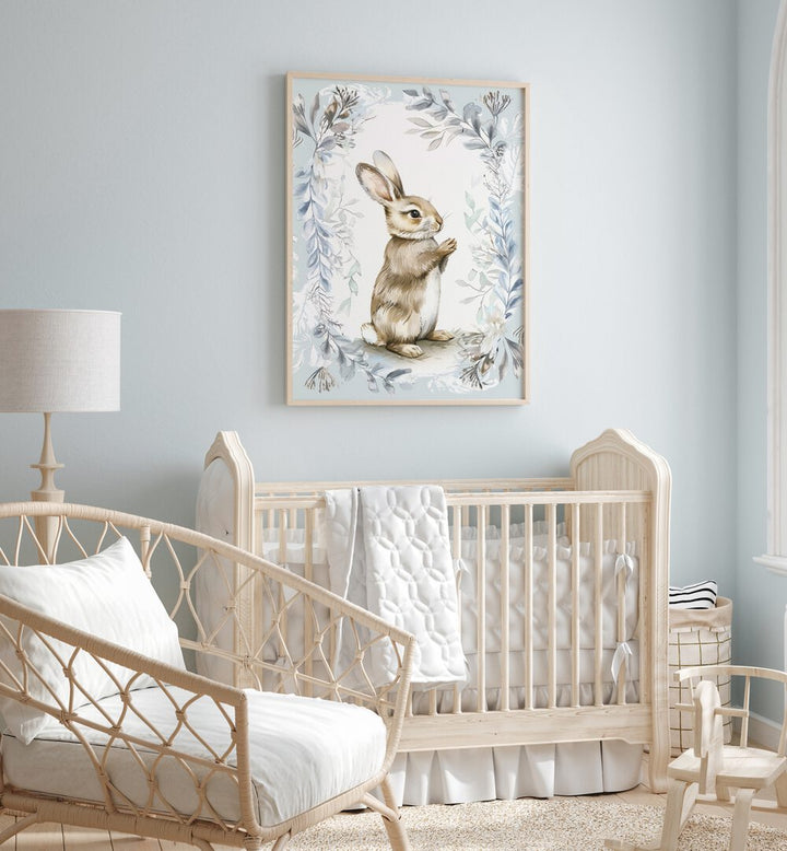 Bunny In Wonderland V Kids Room Paintings Kids Room Wall Art in Oak Wood Plain Frame placed on a wall in a kids room behind an infant's bed