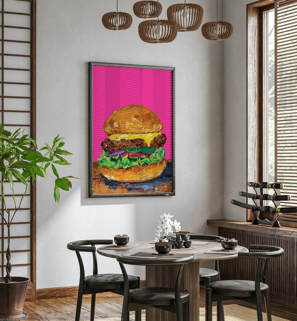 Burger Pink by Alice Straker Cafe Art Prints Cafe Posters in Black Plain Frame placed on a wall in a dining room area beside a window and behind a dining table