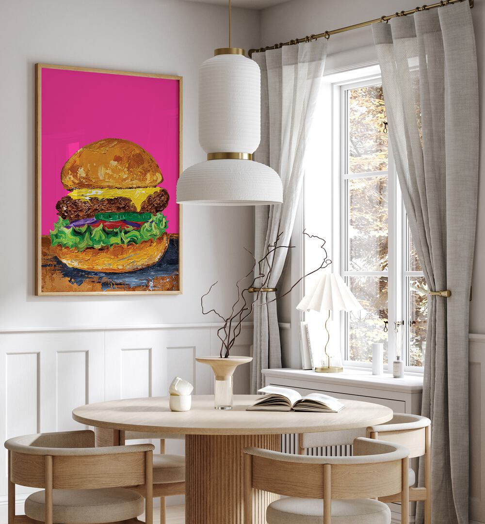 Burger Pink by Alice Straker Cafe Art Prints Cafe Posters in Oak Wood Plain Frame placed on a wall in a dining room area beside a window and behind a dining table