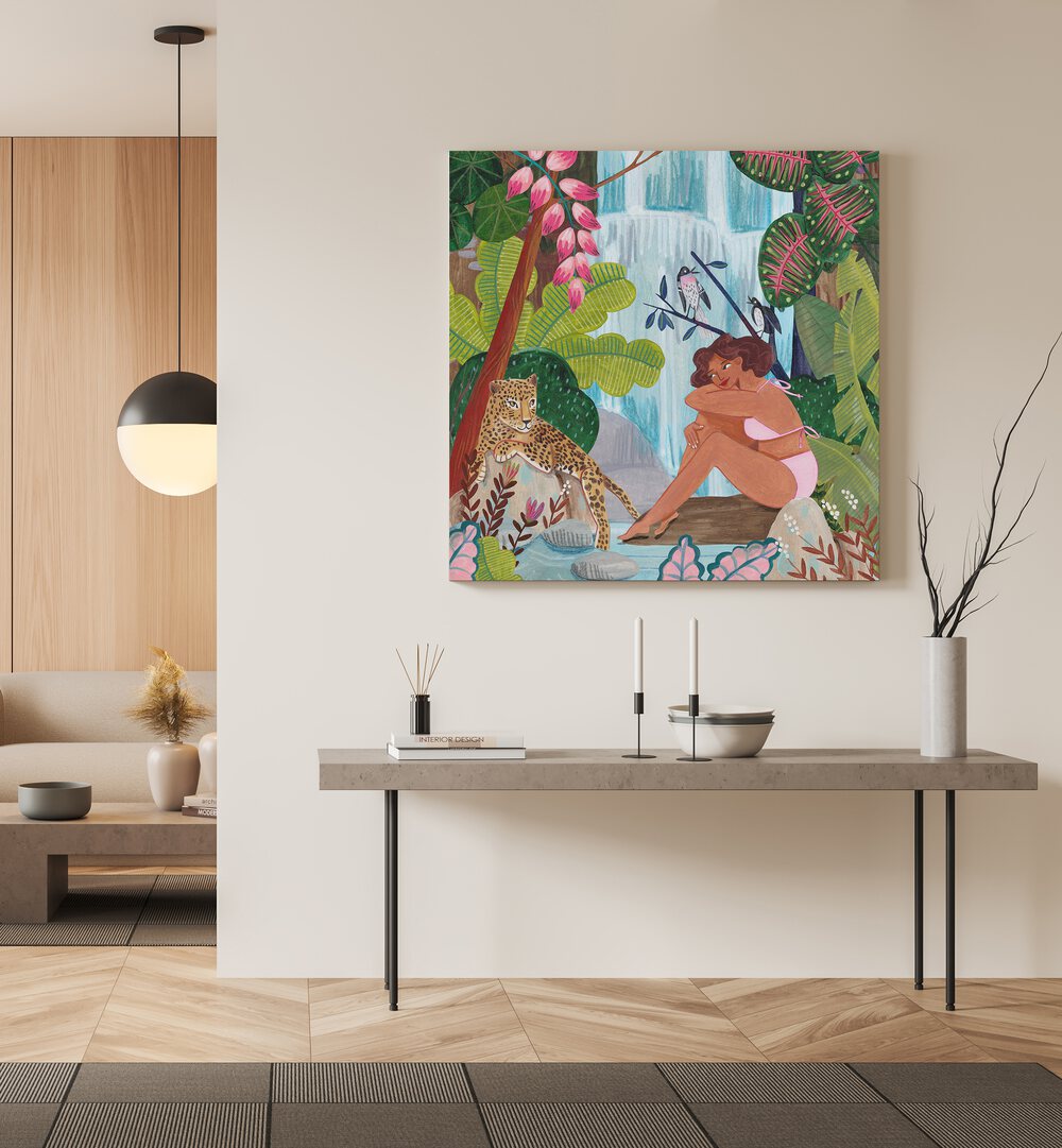 By the Waterfall By Caroline Bonne Muller Woman Illustration Paintings in Gallery Wrap on a cream wall on a table