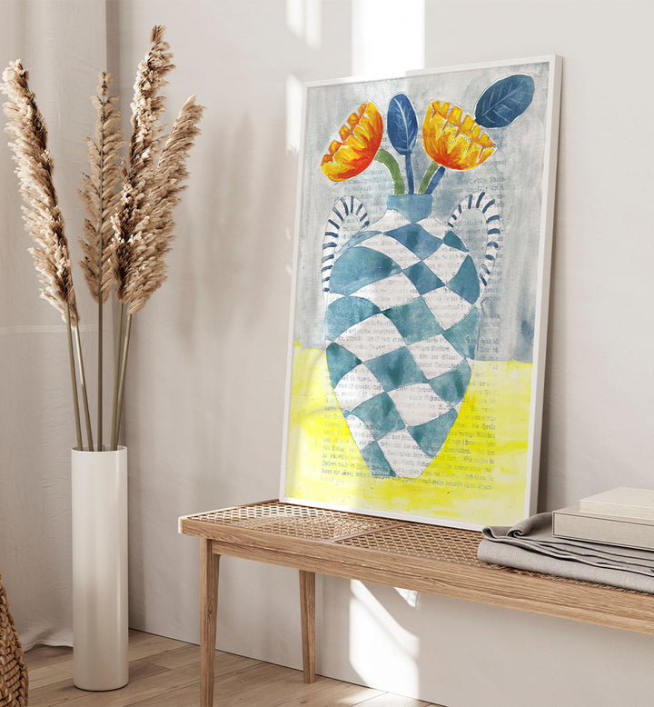 CHECKERED VASE ORANGE FLOWERS