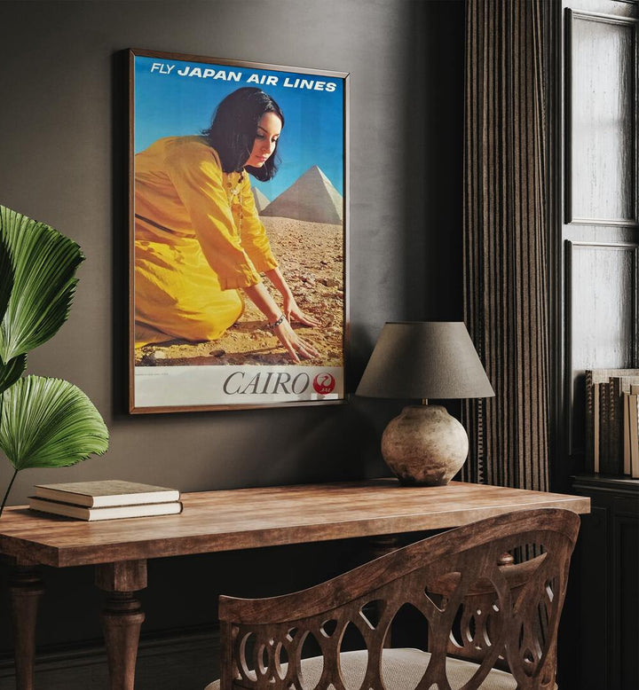 Cairo Retro Vintage Travel Vintage Travel Posters in Dark Wood Plain Frame on a wall above a study table beside a plant