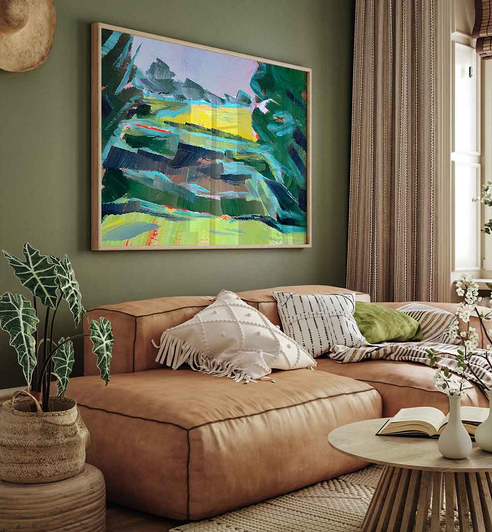 Living room with framed CANOLA FIELD DEUX , LANDSCAPE PAINTINGS vibrant golden canola field painting above leather sofa