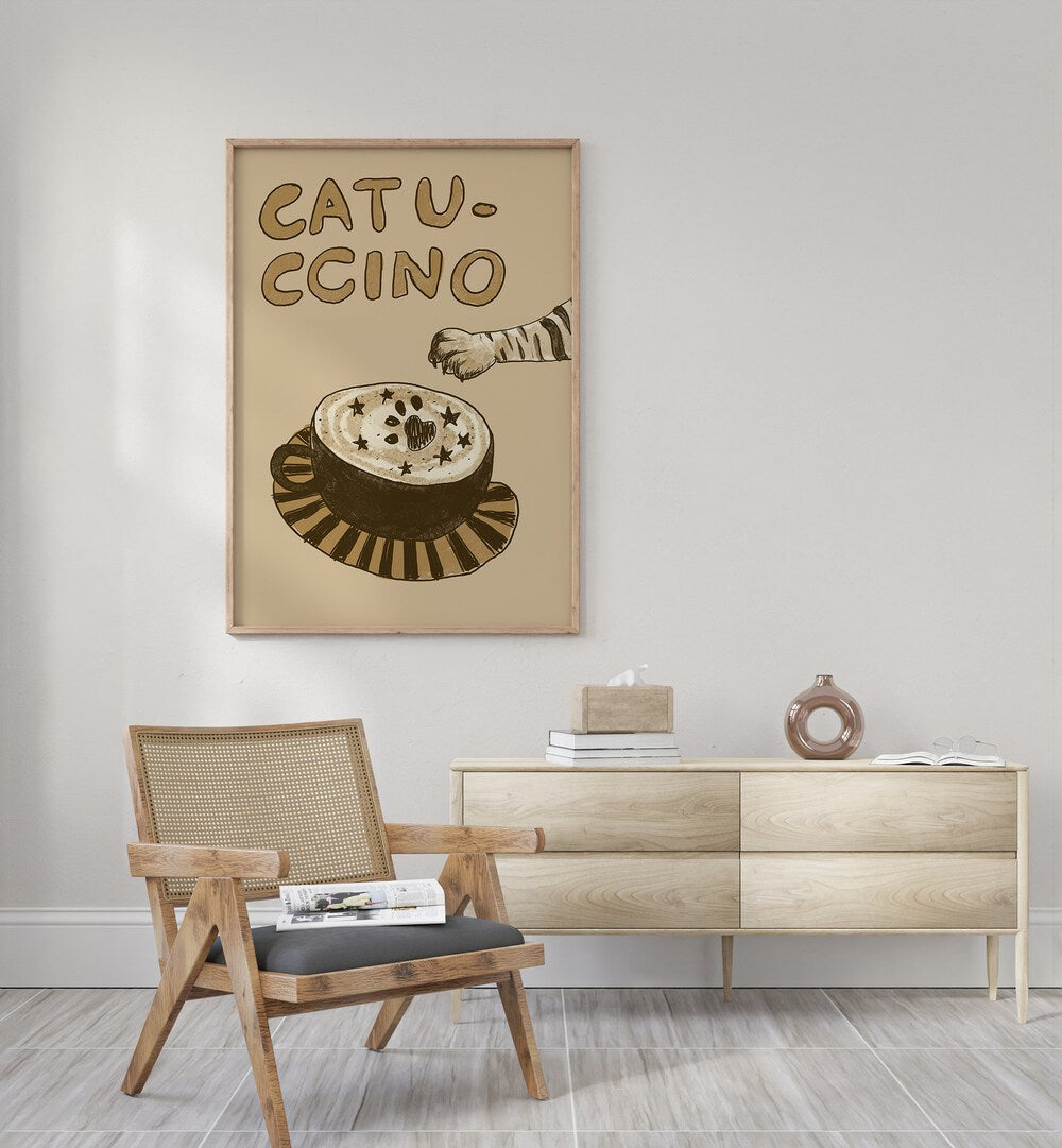 Catuccino by Studio Dolci Cafe Art Prints in Oak Wood Plain Frame placed on a wall behind a console table