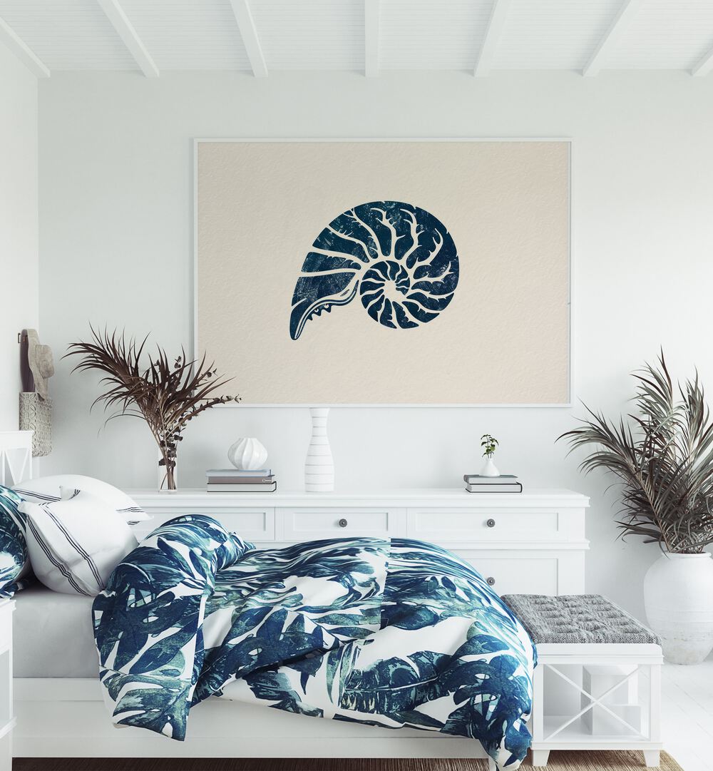 Cerulean Conch V Beach Prints Coastal Wall Art in White Plain Frame placed on a white wall behind a white console table for bedroom