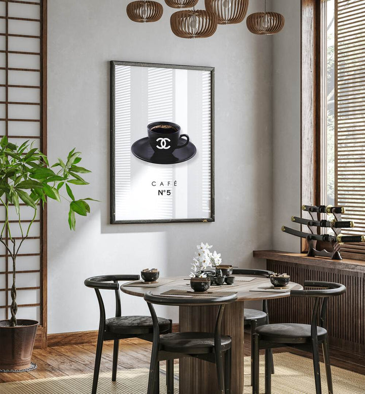 Chanel Cafe Cafe Art Prints Cafe Posters in Dark Wood Plain Frame placed on a White Colored Wall near a Coffee Table in the Dining Room