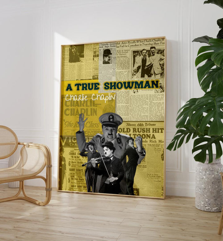 Charlie Chaplin By Grishma Korjani Movie Posters in Oak Wood Plain Frame placed on a Wooden Floor near a White Colored Wall in the Drawing Room