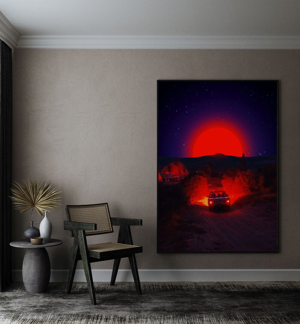 Chasing The Red Sun By Ritvik Takkar Surreal Art Prints in Black Plain Frame placed on a Beige Colored Wall in the Drawing Room