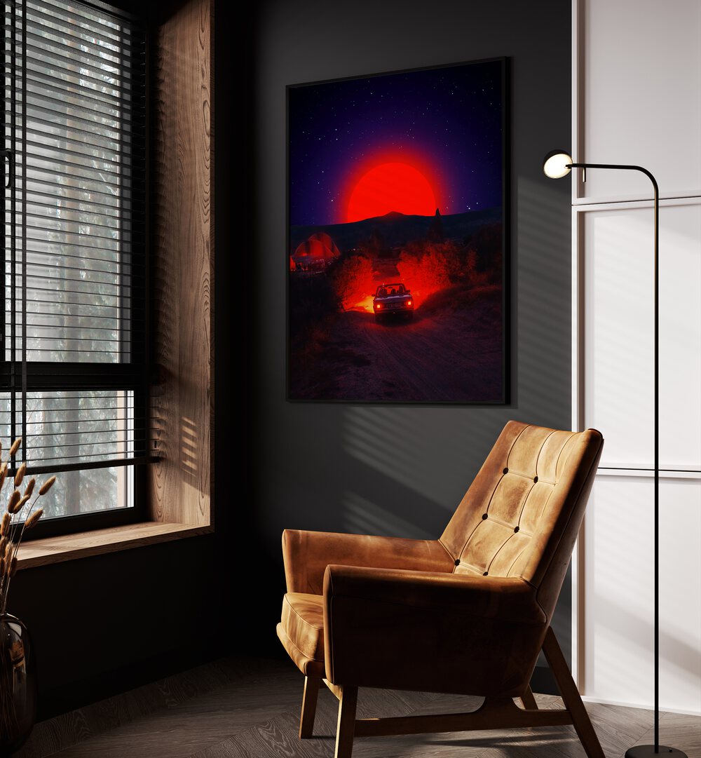 Chasing The Red Sun By Ritvik Takkar Surreal Art Prints in Black Plain Frame placed on a Dark Grey Colored Wall in the Drawing Room