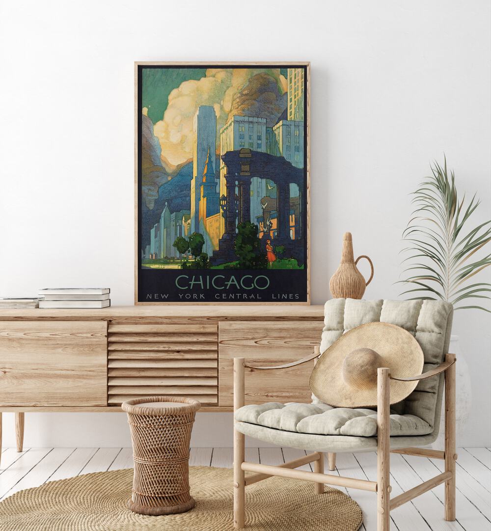 Chicago-Ny Central Lines  Vintage Travel Posters in Oak Wood Plain Frame placed on a console table behind a chair