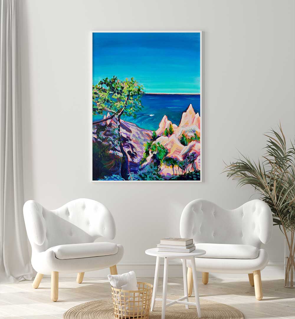 CHIMNEY BLUFFS , LANDSCAPE PAINTINGS vibrant textured cliff and sea scene hung above white chairs in modern living room
