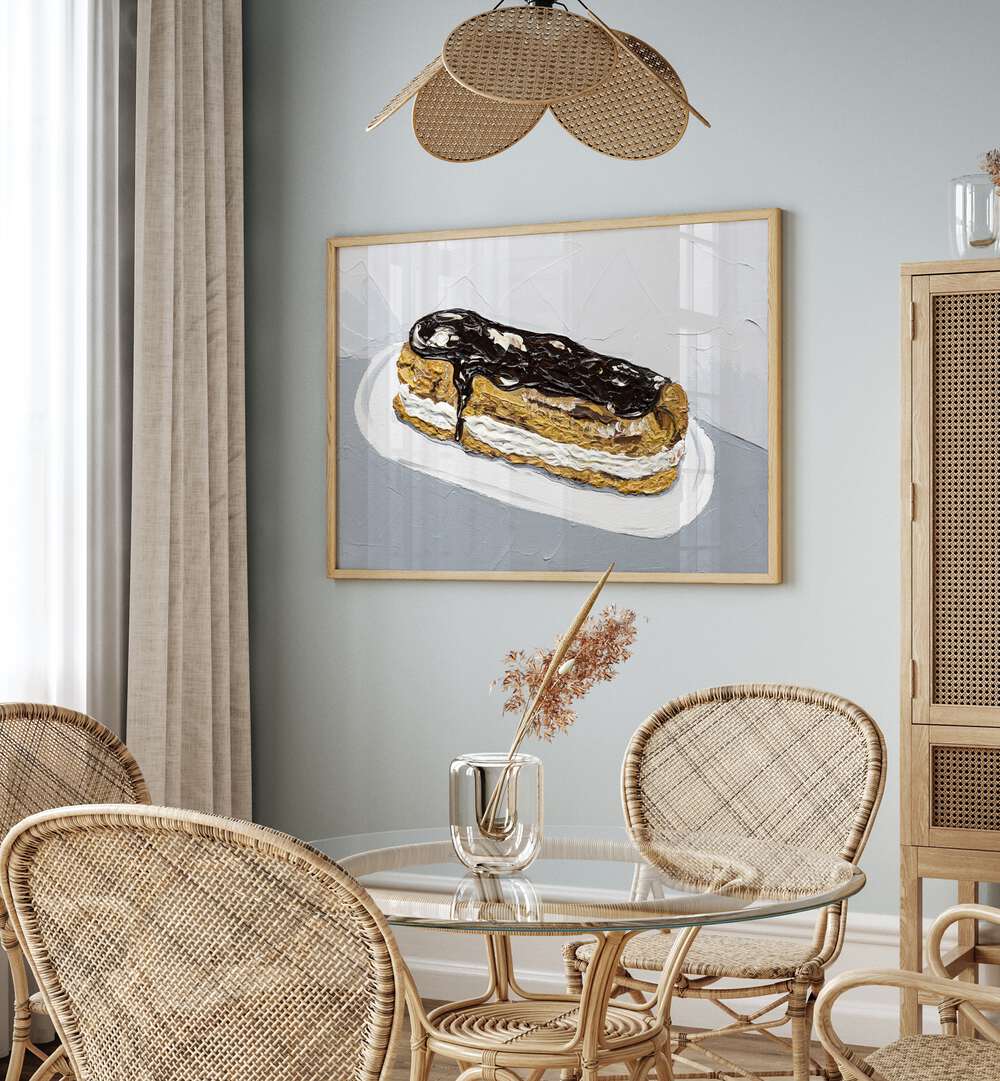 Chocolate Eclair by Alice Straker Cafe Art Prints Cafe Posters in Oak Wood Plain Frame placed on a wall in a dining room area beside a window and behind a dining table