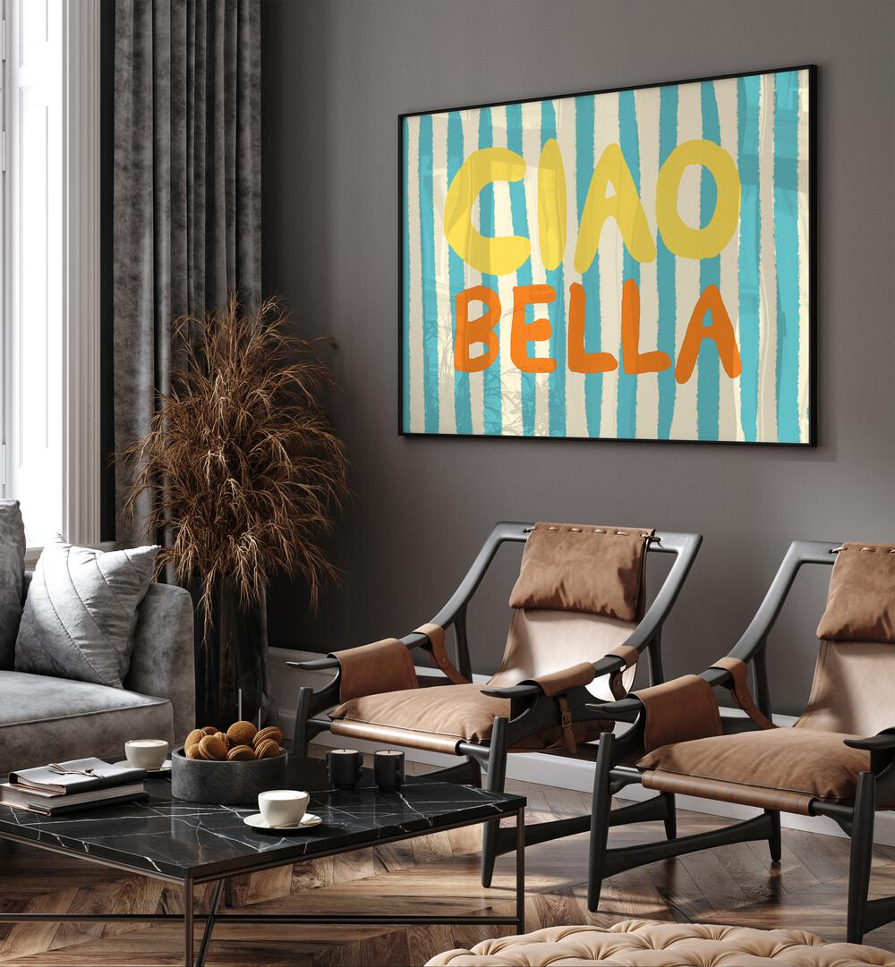 Ciao Bella I by Studio Dolci Quotes Art Prints in Black Plain Frame placed on a wall behind chairs