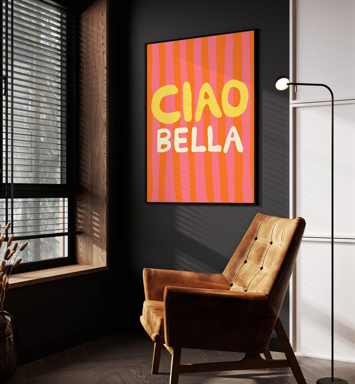 Ciao Bella Vi by Studio Dolci Quotes Art Prints in Black Plain Frame placed on a wall beside an orange sofa and a window