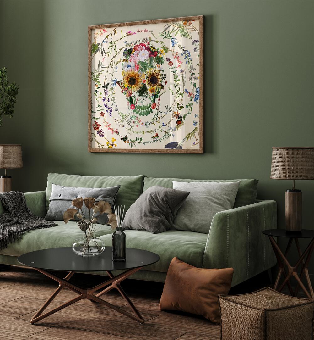 Circle of Life Botanical Art Prints Floral Paintings in Dark wood Plain Frame placed on a living room wall behind a green sofa