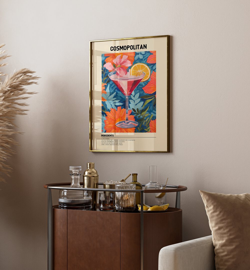 City Lights in a Glass Cosmopolitan Cafe Art Prints Cafe Posters in Gold Plain Frame placed on a wall behind a table